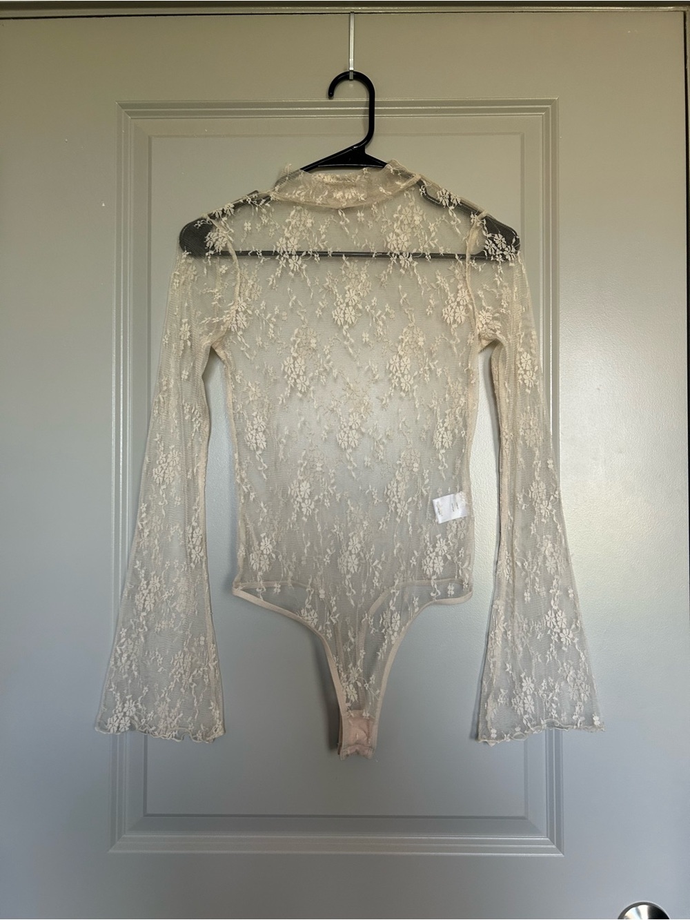 Chelsea & Violet Sheer Lace Long Bell Sleeve Bodysuit - in Floral Cream